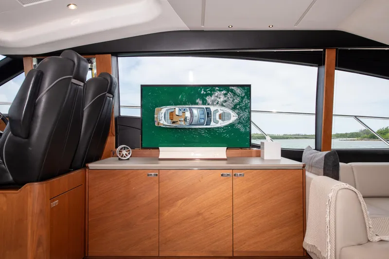 Slide: The Image of Interior of 2021 Princess S66 yacht with modern design and large screen display. - 13