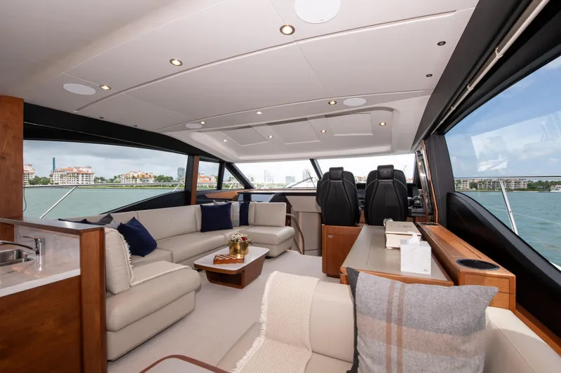 Slide: The Image of Luxurious interior of 2021 Princess S66 yacht with elegant seating and panoramic windows. - 14
