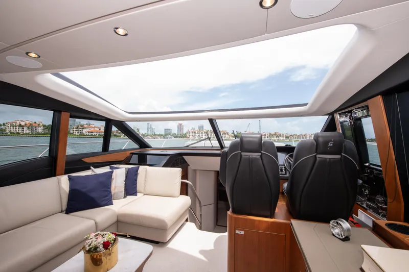 Slide: The Image of Luxurious interior of 2021 Princess S66 yacht with panoramic windows and elegant seating. - 15