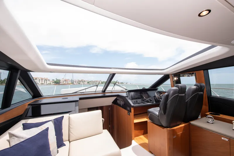 Slide: The Image of Luxurious interior of 2021 Princess S66 yacht with modern helm and comfortable seating. - 16