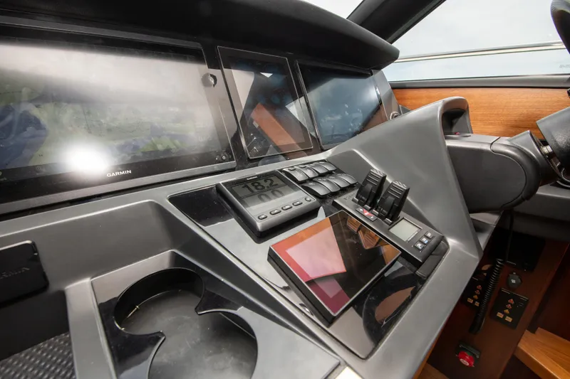 Slide: The Image of Control panel of a 2021 Princess S66 yacht with modern navigation equipment. - 22