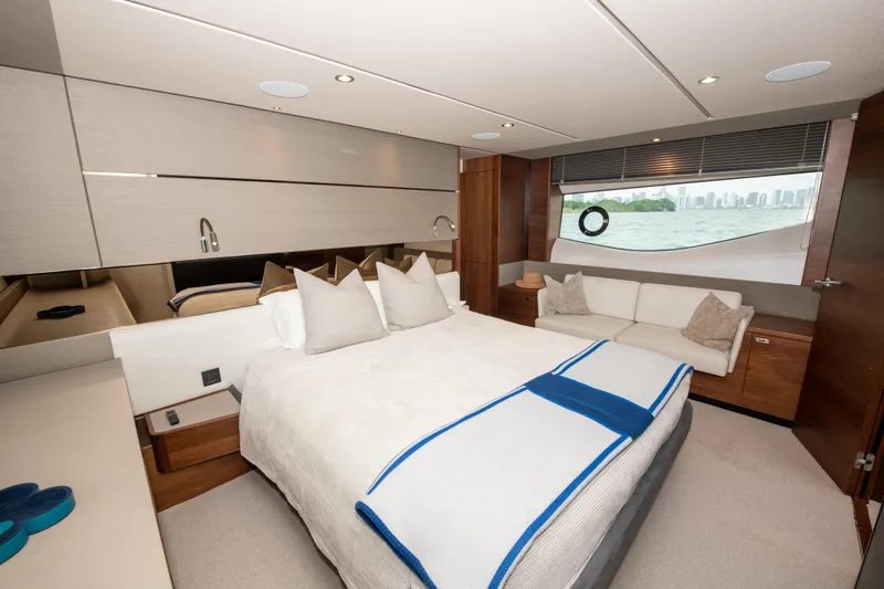 Slide: The Image of Luxurious bedroom interior of 2021 Princess S66 yacht with modern design and elegant furnishings. - 25