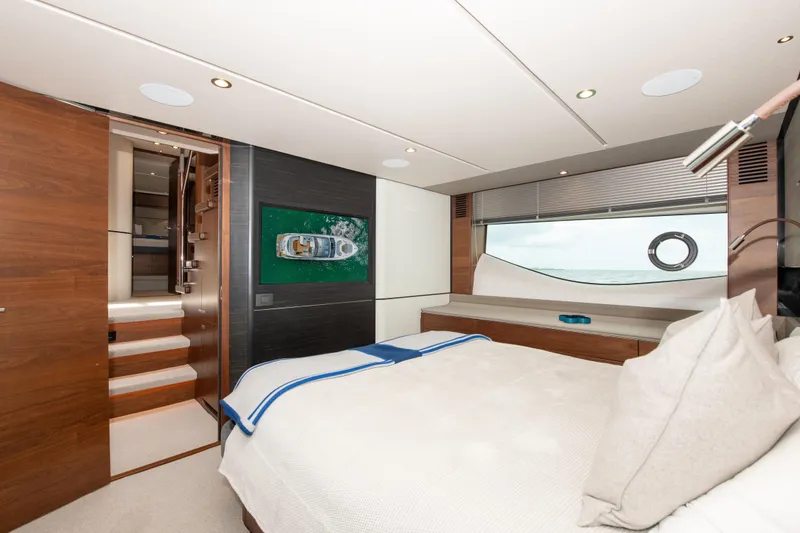 Slide: The Image of Luxurious bedroom interior of 2021 Princess S66 yacht with modern design and ocean view. - 26