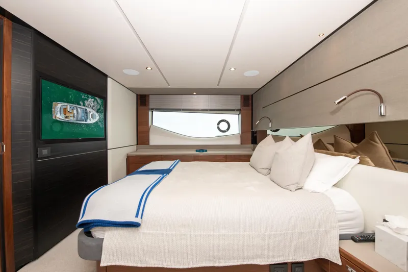 Slide: The Image of Luxurious 2021 Princess S66 yacht bedroom with modern decor and elegant bedding. - 28