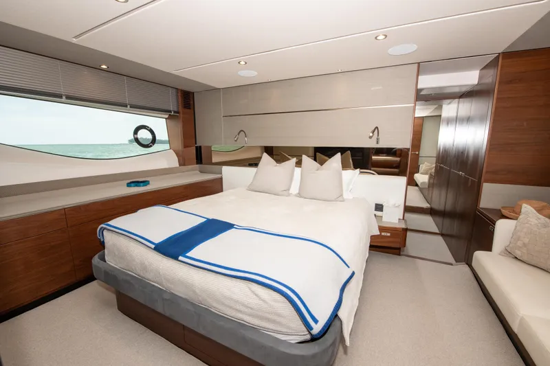 Slide: The Image of Luxurious bedroom interior of 2021 Princess S66 yacht with modern design and ocean view. - 3