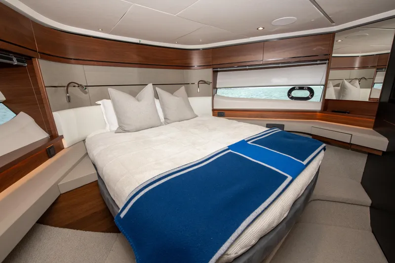 Slide: The Image of Luxurious cabin interior of 2021 Princess S66 yacht with elegant bedding and modern design. - 31