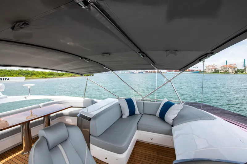 Slide: The Image of Luxurious 2021 Princess S66 yacht interior with elegant seating and scenic water view. - 38