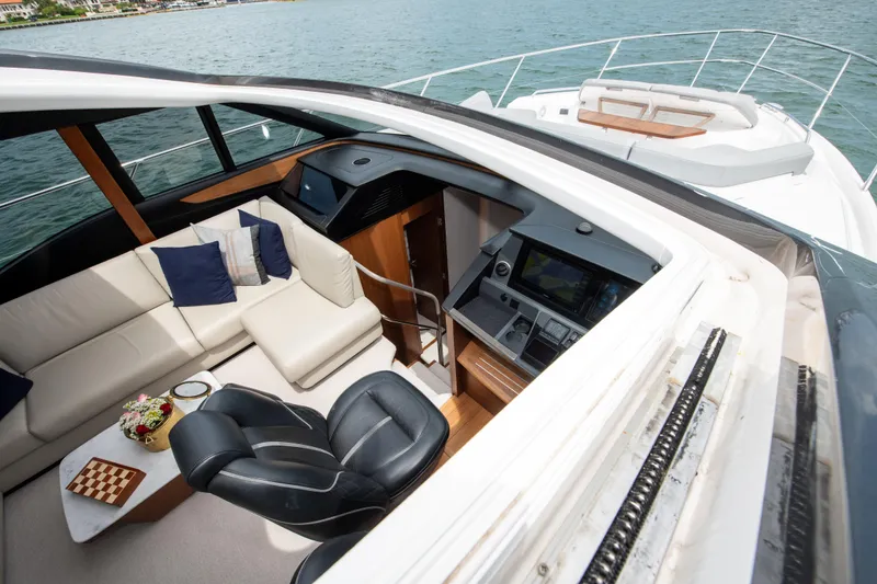 Slide: The Image of Luxurious interior of 2021 Princess S66 yacht with seating and navigation area. - 4
