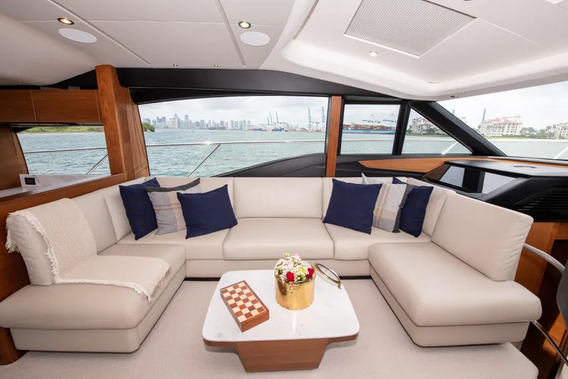 Slide: The Image of Luxurious interior of 2021 Princess S66 yacht with elegant seating and scenic water view. - 8