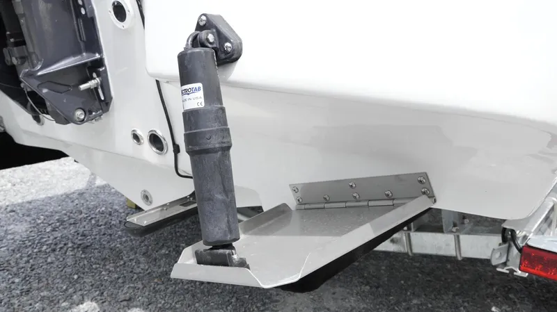 Slide: The Image of Trim tab on 2025 Tidewater 1910 Bay Max boat, enhancing stability and performance. - 10