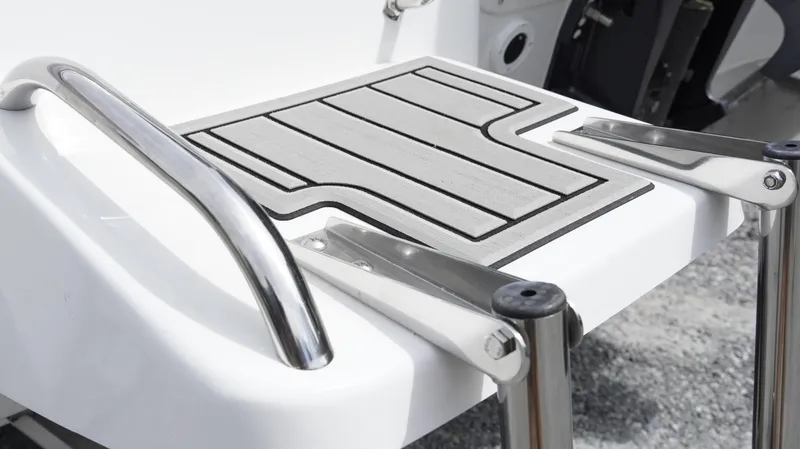 Slide: The Image of 2025 Tidewater 1910 Bay Max boat swim platform with stainless steel rails. - 11