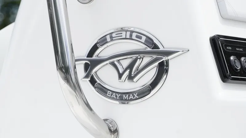 Slide: The Image of Tidewater 1910 Bay Max 2025 emblem on a white boat surface. - 12