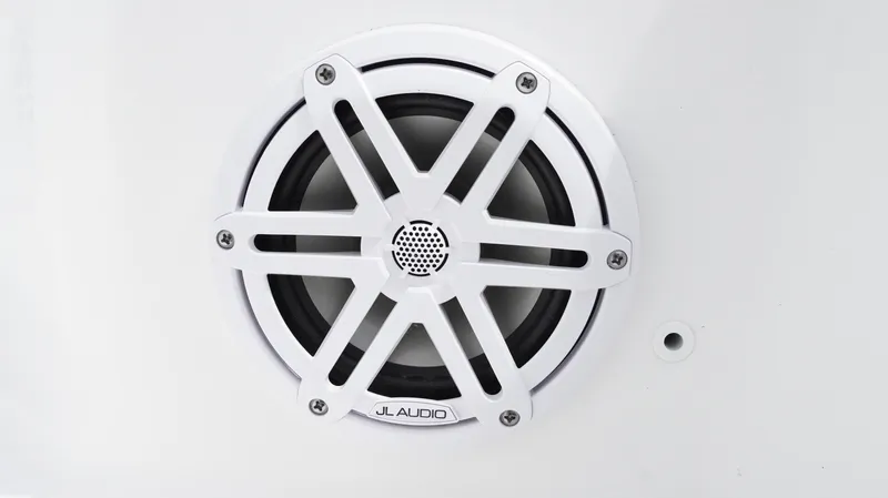 Slide: The Image of White JL Audio speaker on 2025 Tidewater 1910 Bay Max boat. - 17