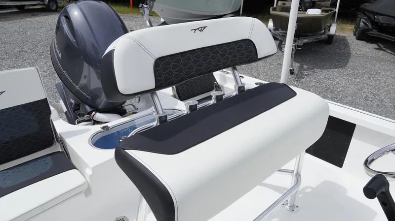Slide: The Image of 2025 Tidewater 1910 Bay Max boat interior with sleek seating and modern design. - 19