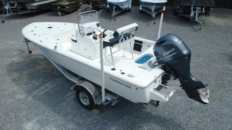Slide: The Image of 2025 Tidewater 1910 Bay Max boat on trailer with Yamaha outboard motor. - 2