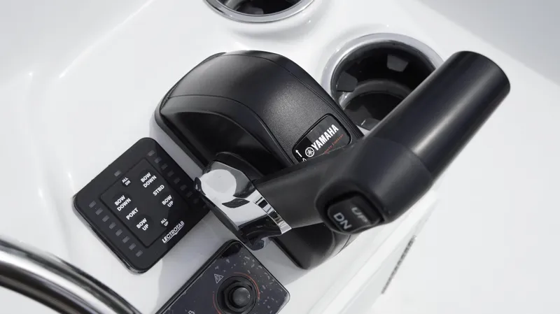 Slide: The Image of Close-up of 2025 Tidewater 1910 Bay Max boat controls with Yamaha throttle. - 25