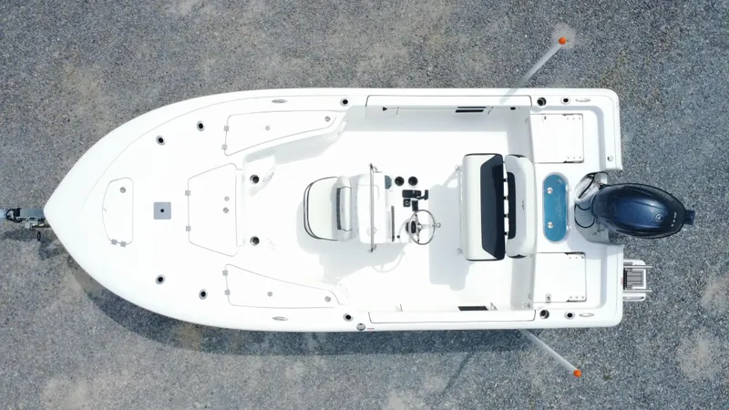 Slide: The Image of Overhead view of 2025 Tidewater 1910 Bay Max boat on gravel surface. - 3