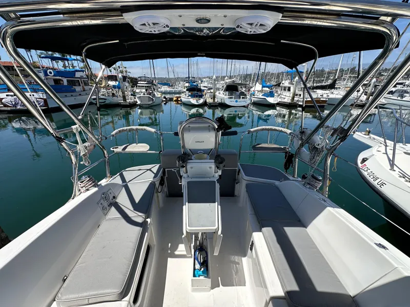 Slide: The Image of Cockpit view of 2013 Hunter 33 sailboat docked in a marina. - 21