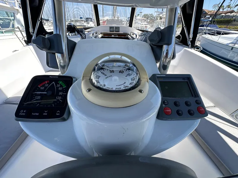 Slide: The Image of Cockpit of 2013 Hunter 33 sailboat with navigation instruments and compass. - 27
