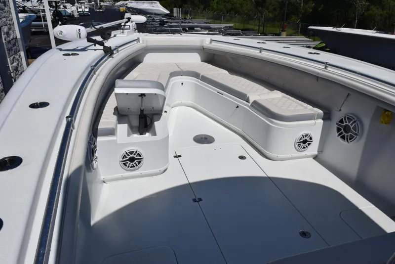 Slide: The Image of 2022 Yellowfin 34 Offshore boat with spacious seating and modern design. - 16