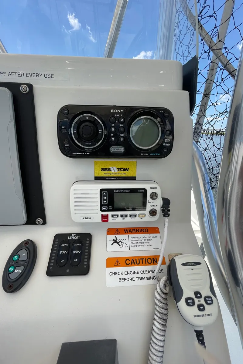 Slide: The Image of 2012 Ranger 2410 Bay Ranger boat console with radio and control panel. - 6