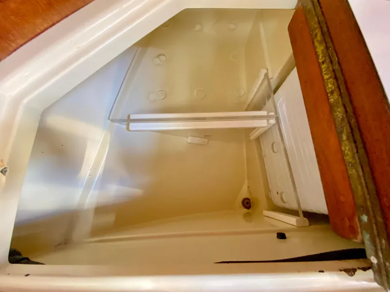 Slide: The Image of Interior storage compartment of a 1998 Pacific Seacraft 37 sailboat. - 20