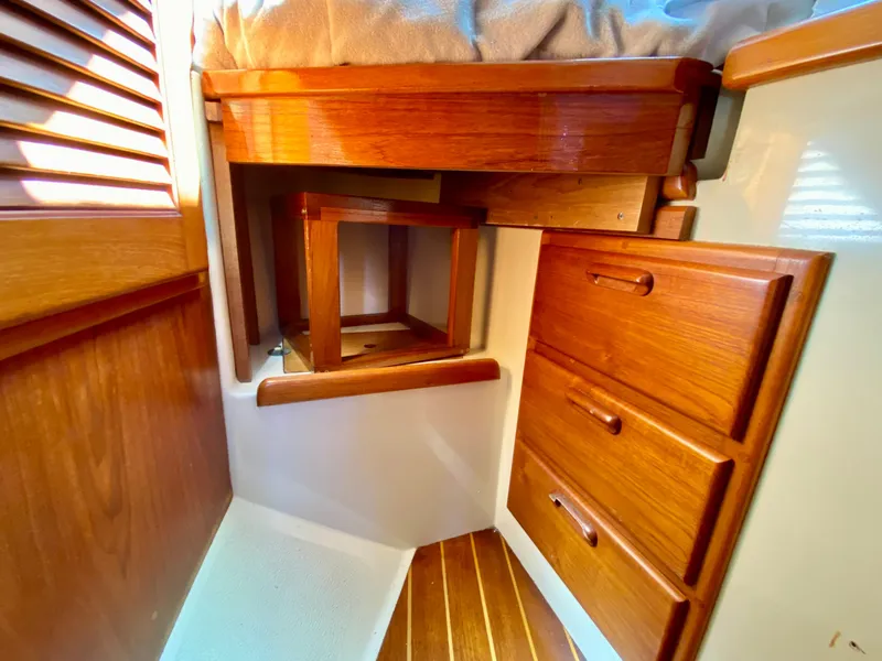Slide: The Image of Interior of 1998 Pacific Seacraft 37 sailboat with wooden drawers and bed. - 35