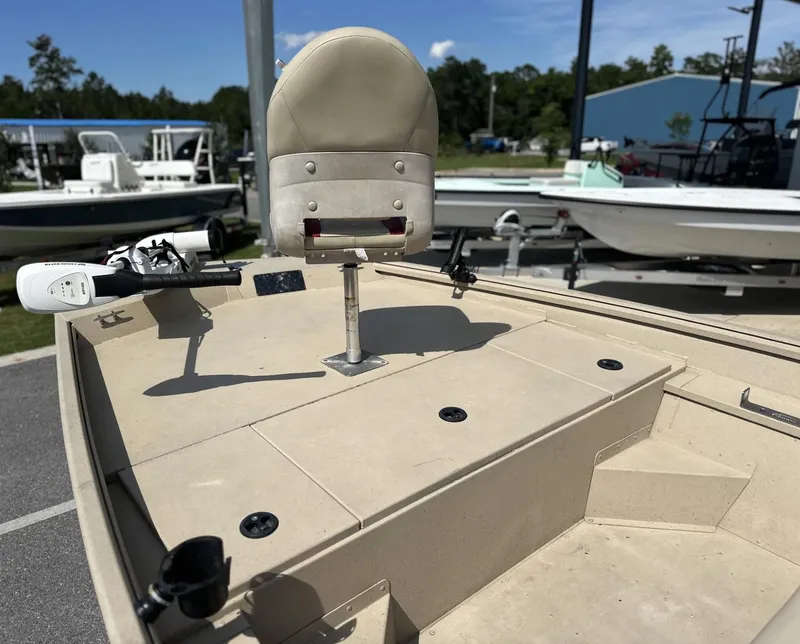 Slide: The Image of 2020 G3 Bay 18 boat with beige seating and fishing rod holders. - 10