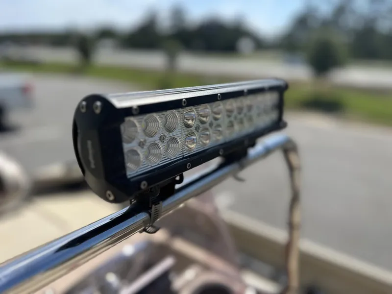 Slide: The Image of LED light bar mounted on a 2020 G3 Bay 18 boat railing. - 12