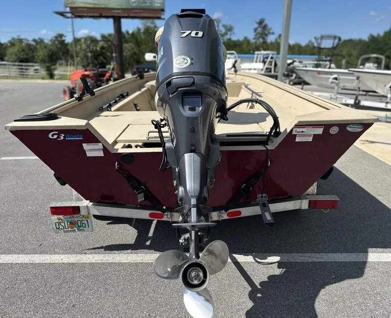 Slide: The Image of 2020 G3 Bay 18 boat with Yamaha 70 outboard motor, parked in a lot. - 16