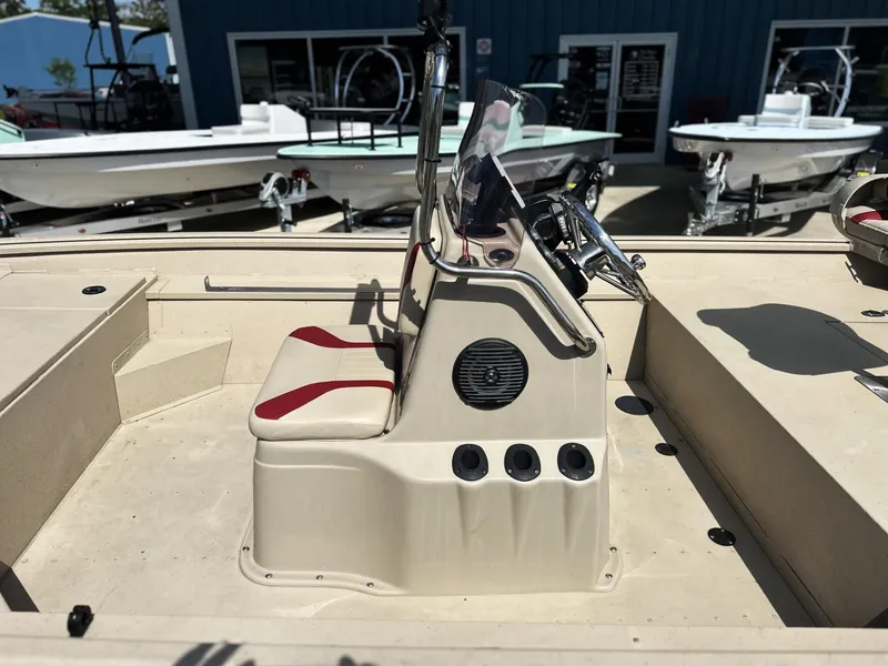 Slide: The Image of Center console of a 2020 G3 Bay 18 boat with red and white seating. - 3