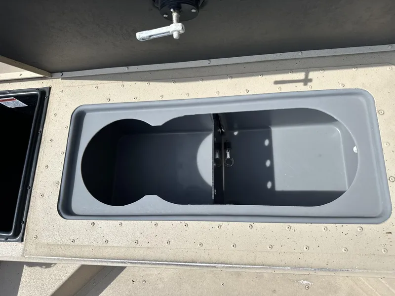 Slide: The Image of Open storage compartment on 2020 G3 Bay 18 boat. - 5