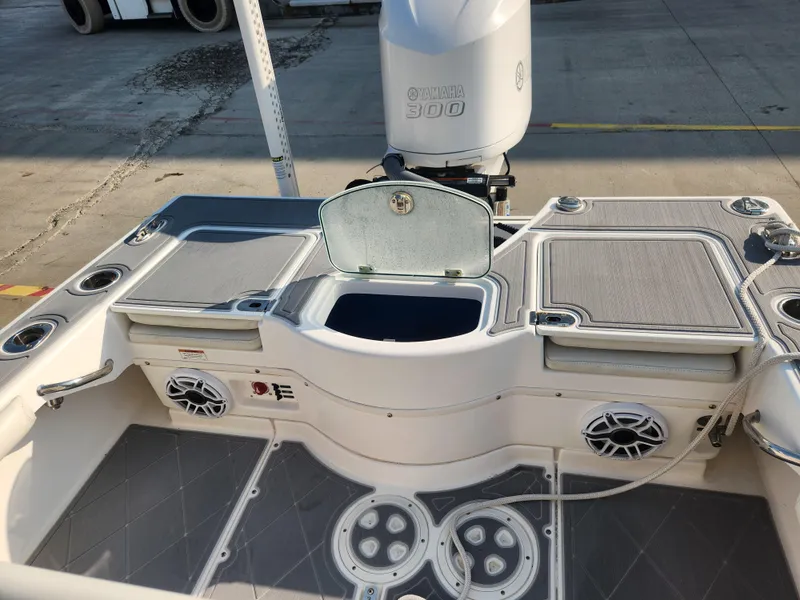 Slide: The Image of 2021 Everglades 243 Center Console boat deck with Yamaha 300 engine. - 12