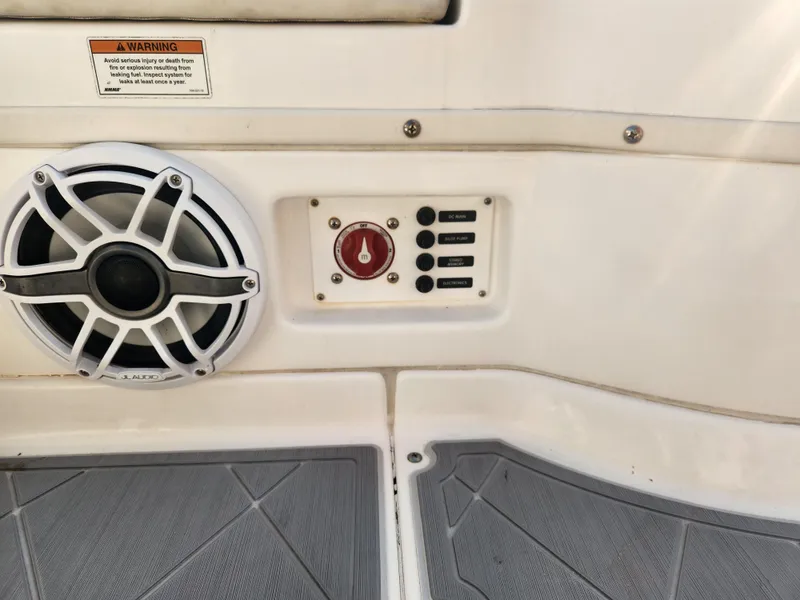 Slide: The Image of Speaker and control panel on 2021 Everglades 243 Center Console boat. - 13