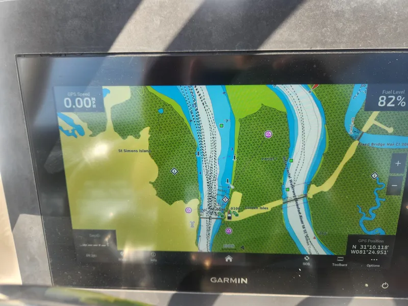 Slide: The Image of Garmin GPS display on 2021 Everglades 243 Center Console boat, showing navigation map. - 16