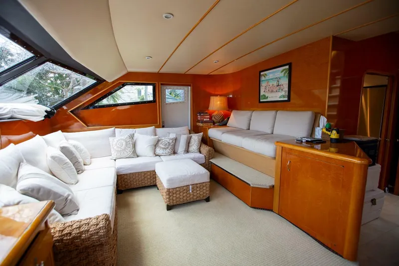 Slide: The Image of Luxurious interior of a 1999 Tarrab Motor Yacht with plush seating and elegant decor. - 8