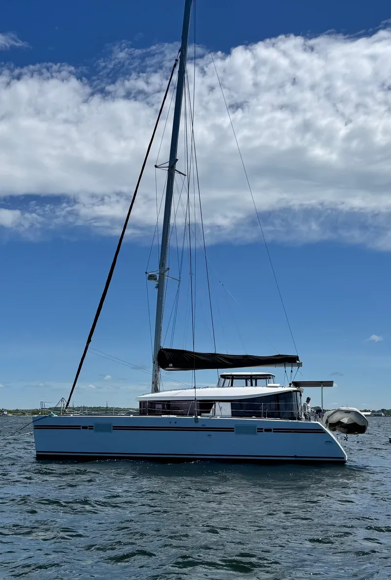 Slide: The Image of 2016 Lagoon 450S catamaran sailing on a sunny day with clear skies. - 1