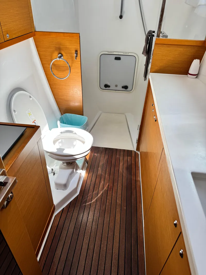Slide: The Image of Interior of 2016 Lagoon 450S yacht bathroom with wooden flooring and modern fixtures. - 30