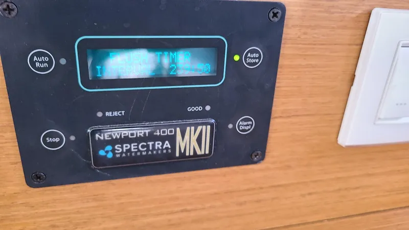 Slide: The Image of Control panel of Newport 400 Spectra Watermakers on Lagoon 450S, 2016 model. - 54