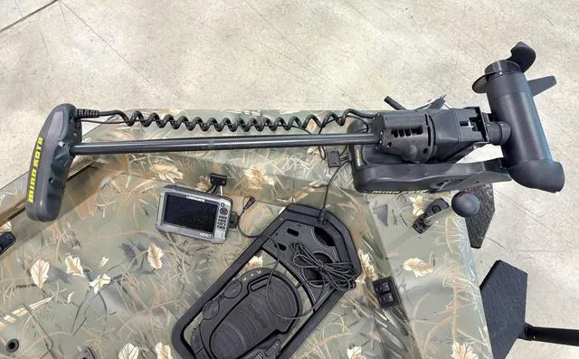 Slide: The Image of 2017 Ranger RT198P boat with trolling motor and fish finder on camo deck. - 6