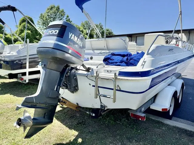 Slide: The Image of 1995 Hurricane Fundeck 230 boat with Yamaha 200 outboard motor on trailer. - 8