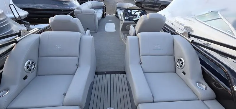 Slide: The Image of 2017 Regency 254 LE3 Sport boat interior with luxurious gray seating and modern design. - 6