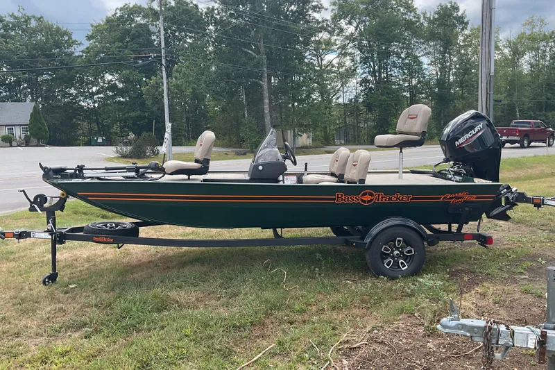 Slide: The Image of 2025 Tracker BT CLASSIC SE fishing boat on trailer, parked outdoors. - 9