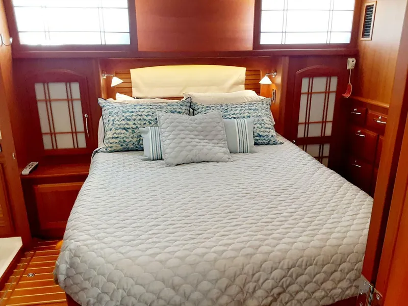 Slide: The Image of Luxurious bedroom interior of 2016 Sabre 48 Salon Express yacht with elegant bedding. - 23