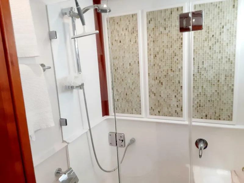Slide: The Image of Modern shower in 2016 Sabre 48 Salon Express yacht bathroom. - 30