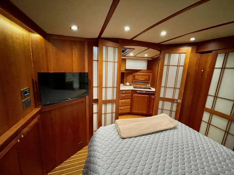Slide: The Image of Luxurious interior of 2016 Sabre 48 Salon Express yacht with wood paneling and modern amenities. - 43