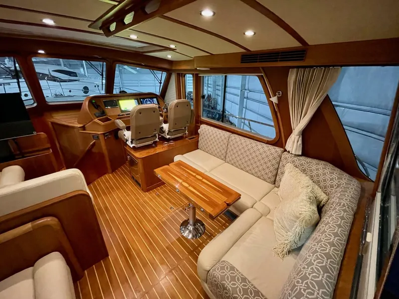 Slide: The Image of Luxurious interior of 2016 Sabre 48 Salon Express yacht with elegant seating and helm. - 47