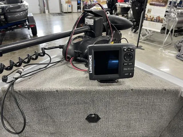 Slide: The Image of 2010 Tracker Pro-Guide V-16 SC boat with Lowrance fish finder and trolling motor. - 24