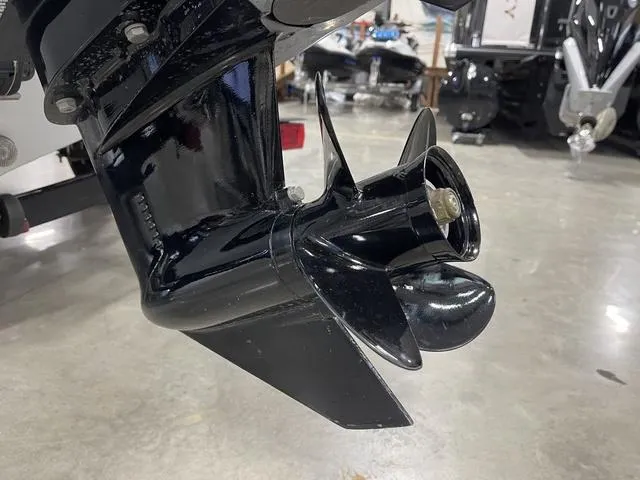 Slide: The Image of 2010 Tracker Pro-Guide V-16 SC boat propeller in a showroom setting. - 7