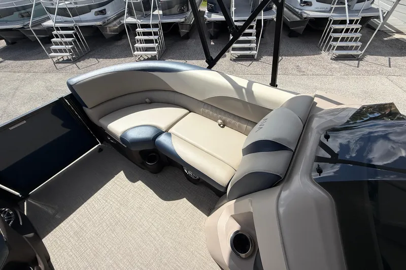 Slide: The Image of Luxurious seating on 2025 Avalon 2385 LSZ Quad Lounger Tri Toon boat, showcasing high-performance design. - 28